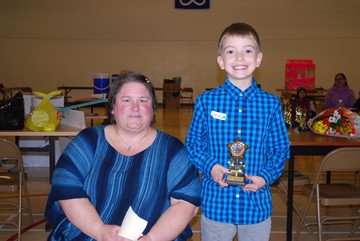 Heather Hempstock (left), Jacob Dunham (right), 1st place Grades 1 - 2, How to make a lemon battery