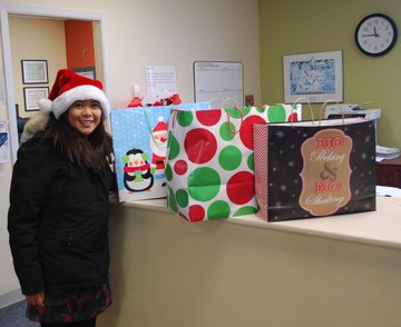 Accounts Manager Anne Louise Walty dropped off the gift bags on behalf of Northland central office staff to support Town of Peace River's Adopt-a-Grandparent 